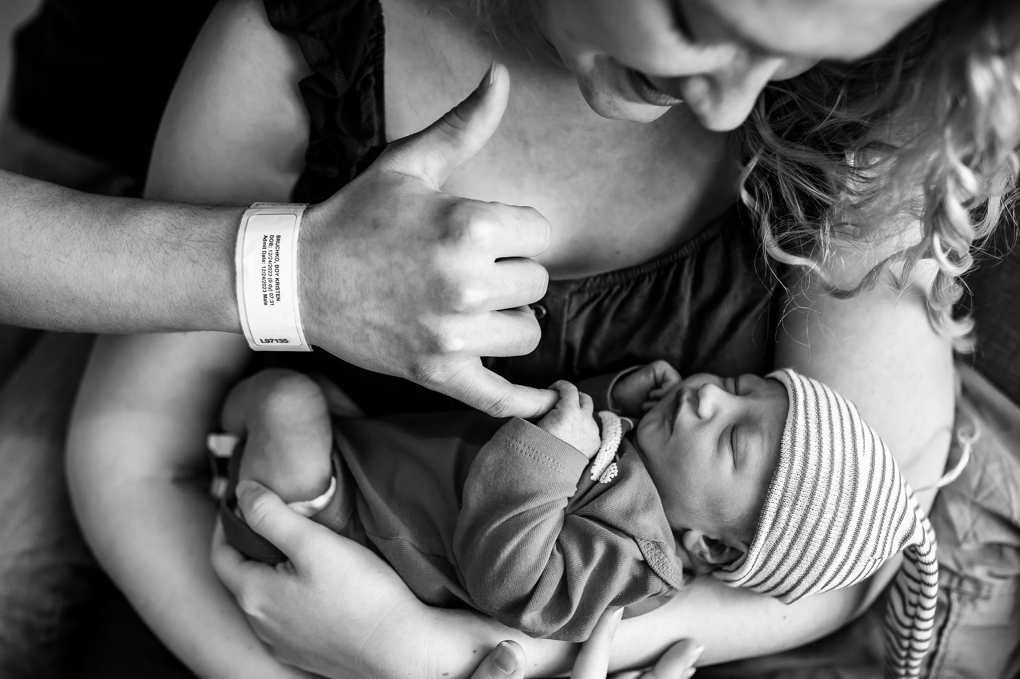 Boulder Fresh 48 Photographer with newborn baby boy at Avista Hospital in Louisville, Colorado
