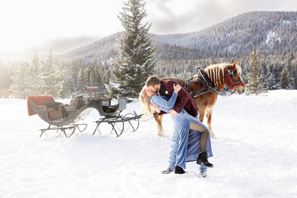 Sleigh Ride Engagement Session with Colorado Lifestyle Photography at Golden Horseshoe Sleigh Rides in Breckenridge